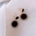 Elegant French style gold drop earrings with black circular inlay and sparkling crystal border - Black Double-Layer Disc Rhinestone Drop Earrings (E2600金)