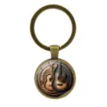 Vintage bronze keychain with detailed guitar wood grain pattern glass cabochon pendant - Antique Bronze