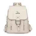 Elegant beige faux leather backpack with buckle detail and textured finish - Off White