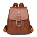 Premium brown faux leather backpack featuring kangaroo logo and metal buckle detail - Brown