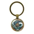 Vintage nautical compass keychain with ocean waves and sailboat design in antique bronze. - Compass Style (XSWX9391) / Antique Bronze