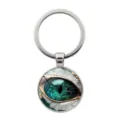 Creative mystical green dragon eye keychain with glass cabochon for car and bag - Silver
