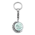 Close-up detail of 360-degree rotating moon keychain with Luke 1:37 scripture quote - Luke 1:37 (XSWX9352-1)