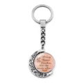 Rotating silver moon keychain with inspirational 'Be Strong' quote on pink background - Joshua 1:9 (XSWX9352-5)