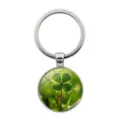 Detailed macro view of a lucky four-leaf clover glass cabochon keychain pendant charm - Clover Style 12 (Silver-12)
