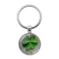 Close-up detail of a lucky four-leaf clover keychain with green plant glass cabochon - Clover Style 10 (Silver-10)