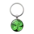 Detailed view of the four-leaf clover pattern inside the glass cabochon keychain - Clover Style 4 (Silver-4) / Silver