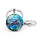 Detail view of a Cancer zodiac glass cabochon keychain with a silver lobster clasp - Cancer (XSWX5942)
