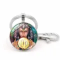 Close-up view of Virgo zodiac sign glass cabochon keychain with metal lobster clasp - Virgo (XSWX5942)