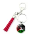Porte-clés drapeau palestinien avec pompon rouge et symbole de paix sur fond blanc - Style Signe de Paix (XSWX6158-7)