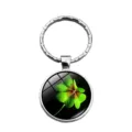 Gros plan sur le porte-clés pendentif trèfle à quatre feuilles - Style Trèfle Base Noire (XSWX6006-9)