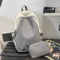 Μινιμαλιστικό δίχρωμο φοιτητικό σακίδιο πλάτης σε γκρι και λευκό με ασορτί τσαντάκι αποθήκευσης - Στυλ 3 / Γκρι Με Κασετίνα