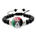 Dettaglio dello stemma dell'aquila palestinese su bracciale di perle nere - Emblema dell'Aquila di Saladino (XSWX6090-10)