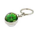 Macro view of the lucky four-leaf clover design under a clear glass dome on a metal keychain - Domed Glass Clover (XSWX6005-7)