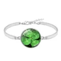 High-definition macro view of green four-leaf clover pattern inside glass cabochon - Lucky Clover Style 4 (XSWX6011-4)