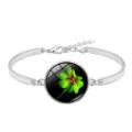 Silver-colored alloy bracelet featuring a lucky green four-leaf clover glass cabochon - Lucky Clover Style 9 (XSWX6011-9)