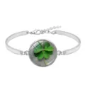 Silver-plated bangle bracelet featuring a vivid four-leaf clover time gem cabochon - Lucky Clover Style 10 (XSWX6011-10)