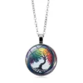 Detail view of a colorful Tree of Life glass cabochon pendant with a silver link chain. - Life Tree Pattern 4 (XSWX6072-4)