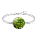 Elegant silver alloy four-leaf clover time gem glass cabochon bangle bracelet for women - Lucky Clover Style 12 (XSWX6011-12)
