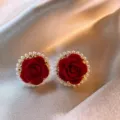 Detailed close-up showing texture of French vintage red flocked rose earrings with pearl border - Flocked Rose Style (E4443) / Red