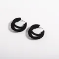 Detailed view of elegant black flocked double-hoop earrings with soft velvet finish - Flocked Black Double C Style (E0094)