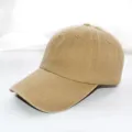 Classic washed cotton baseball cap in khaki, featuring a curved brim and breathable eyelets. - Adult 55-59cm / Khaki