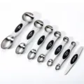 Set di cucchiai misuratori magnetici in acciaio inox con livellatore per cucinare - Set da 7 Pezzi / Nero
