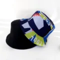 Reversible bucket hat with solid black and cool geometric print, stylish casual sun hat. - Adult Size 55-58cm / Blue White Green Geometric Style (14)