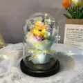 Macro view of glowing soap flower bouquet inside a large glass dome with LED lights. - Large Glass Dome / Blue