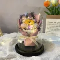 Elegant LED lit sunflower and rose soap flower bouquet in a glass dome gift display - Large Glass Dome / Purple