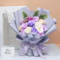 Detailed view of elegant purple artificial soap flower bouquet with gift bag and greeting card. - With Gift Bag / Purple