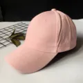 Side view detail of a plain light pink baseball cap with curved brim - Adult Adjustable 55-59cm / Pink