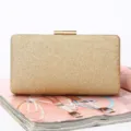 Elegant gold glitter clutch bag for women, sparkling evening bag with metal clasp for party. - L 18cm * W 5cm * H 10cm / Gold