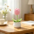Handmade crochet pink tulip potted plant on a wooden desk with soft sunlight - Single Head Tulip - Pink