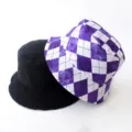 Detailed view of reversible bucket hats in solid black and purple diamond checkered pattern - Adult 55-58cm / Diamond Purple
