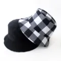 Stylish reversible bucket hat featuring solid black and black white plaid pattern - Adult 55-58cm / Black Checkerboard
