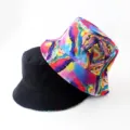 Reversible bucket hat detail showing black and vibrant multi-color watercolor abstract print. - Style 32