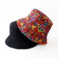 Reversible bucket hat detail, double sided design with digital print and solid black style. - Style 33
