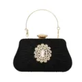 Elegant black evening clutch bag with sparkling rhinestone flower and gold handle. - Black