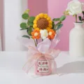 Handmade crochet sunflower bouquet in pink bucket for teachers day gift table decoration detail - Teachers Day Bucket Bouquet / Orange