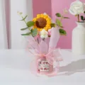 Handmade crochet sunflower flower bouquet detail view with gift wrapping for teacher gift. - Teachers Day Bucket Bouquet / Pink