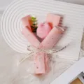 Handmade mini crochet tulip bouquet with pink wrapping paper and ribbon, perfect for gifting. - Pink