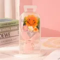 Detailed view of a handmade crochet sunflower bouquet in a transparent PVC gift box - Pink Style (Hand-Carried Box)