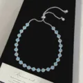 Bracelet à cordon coulissant en argent avec pierres de zircone rondes bleu clair étincelant. - Style Réglable à Bulles (R1471) / Bleu