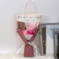 Vista detallada de un ramo de flores de jabón en una bolsa de regalo LED clara. - Pack de 3 (Con Luz LED y Bolsa de Regalo) / Rosa loto
