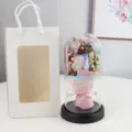 Detail view of eternal rose glass dome with dried gypsophila, elegant gift packaging. - Rose Pink Avalanche