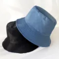Detailed view of fashionable reversible outdoor bucket hats in black and blue colors. - Adult 55-58cm / Black Blue