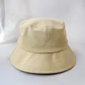 Minimalist beige cotton bucket hat for sun protection, featuring a wide stitched brim - Adult 56-58cm / Bucket Hat Style / Beige