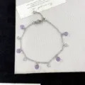 Elegant silver bracelet with purple crystal beads and sparkling clear stones - Bracelet / Purple Style (R0616)