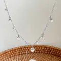 Elegant silver chain necklace featuring clear crystal ball droplets and sparkly stones - White Style (R1763)